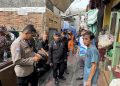 Kerja Bakti Brimob dan Warga Pasca Kebakaran di Kwitang