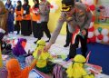 Memupuk Cinta Tanah Air Melalui Pembagian Bendera Merah Putih ke Anak PAUD